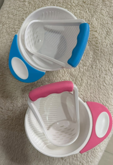 Portable baby food grinding bowl and masher set.